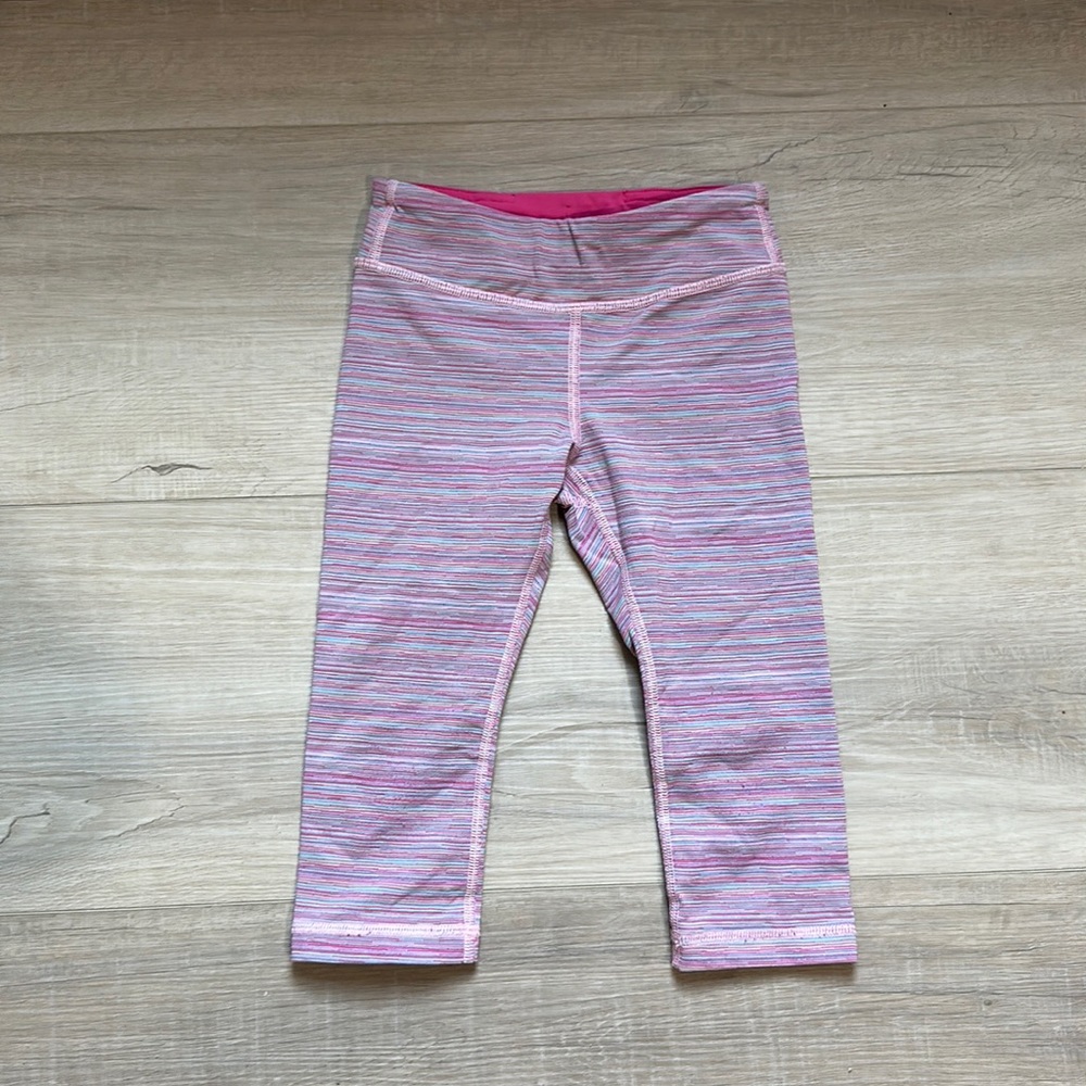 Ivivva stripped leggings, child size 4, in good condition.